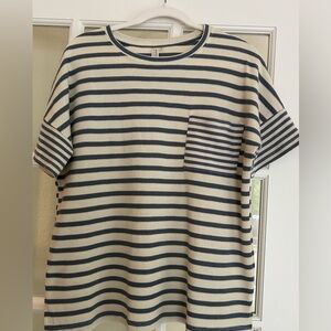 Knit top by Hayden. Denim & cream color.